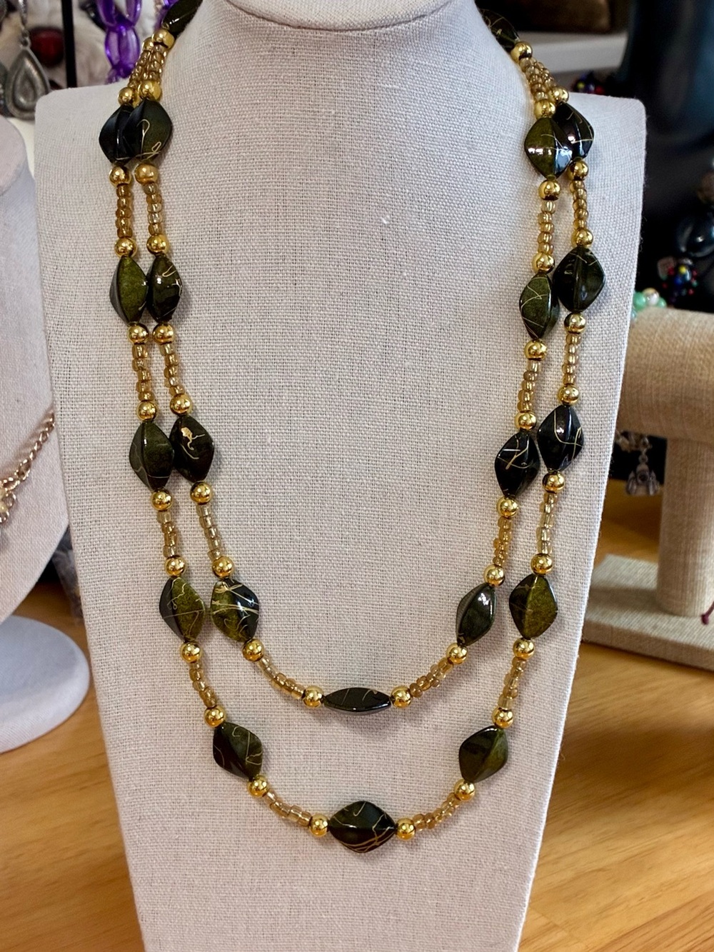 Gold-tone and Olive Double-Strand Beaded Necklace.